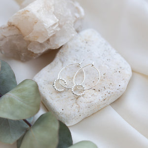 Linked Twist Hoops